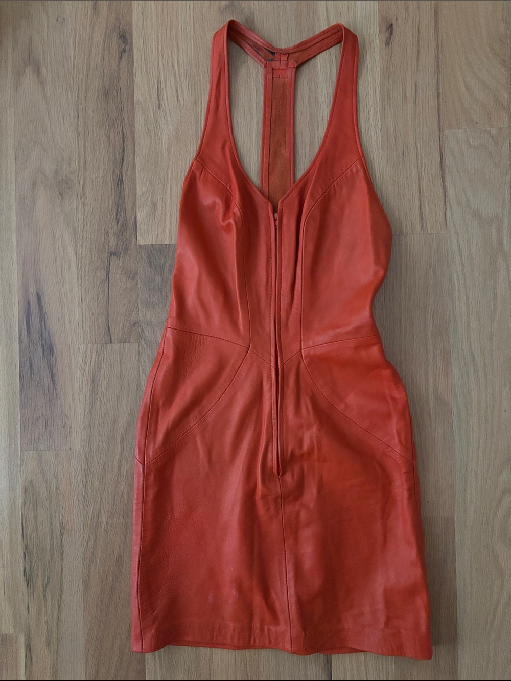 Fitted Orange Leather Mini Dress with Racerback Detail